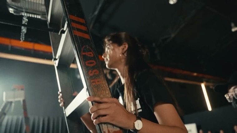 Crew member setting a light on the game show set